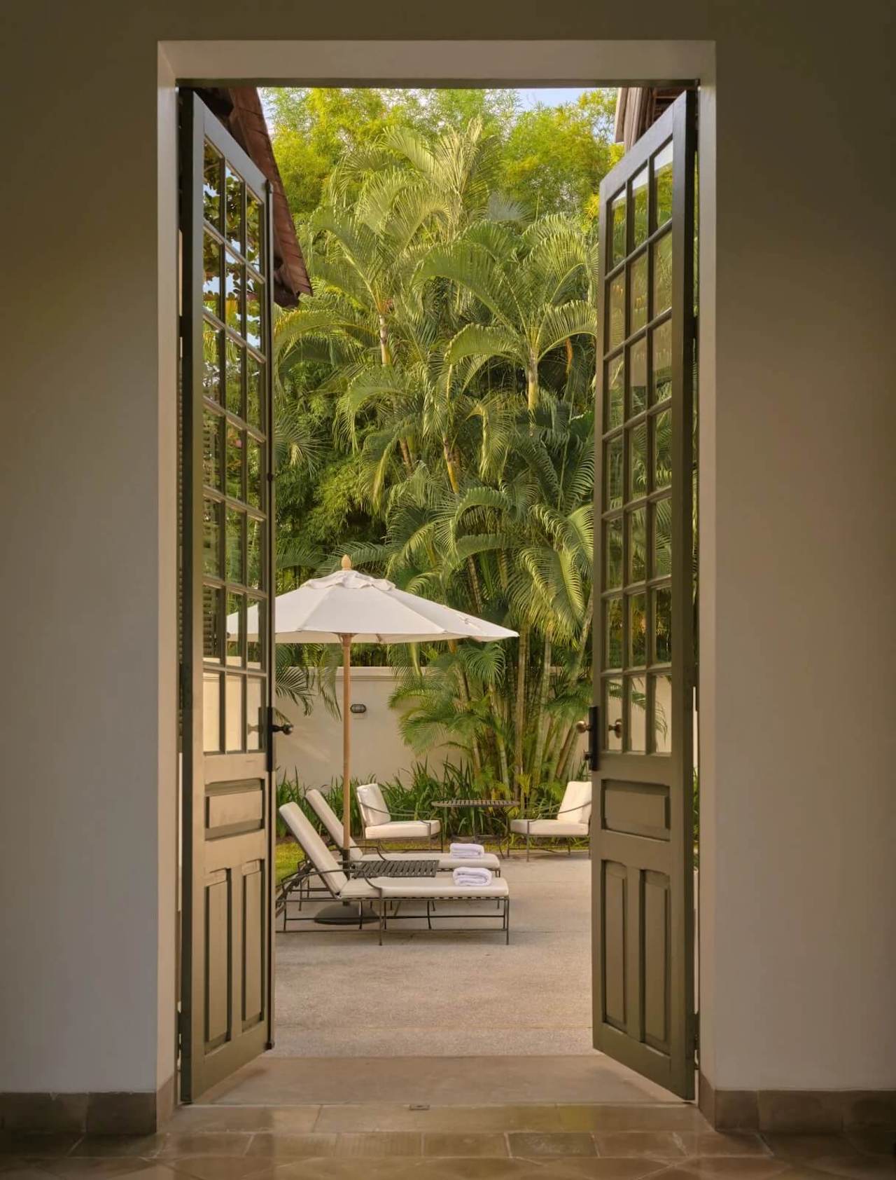 amantaka_laos_-_accommodation_khan_pool_suite_9_exterior_pool_outdoor_terrace_entrance